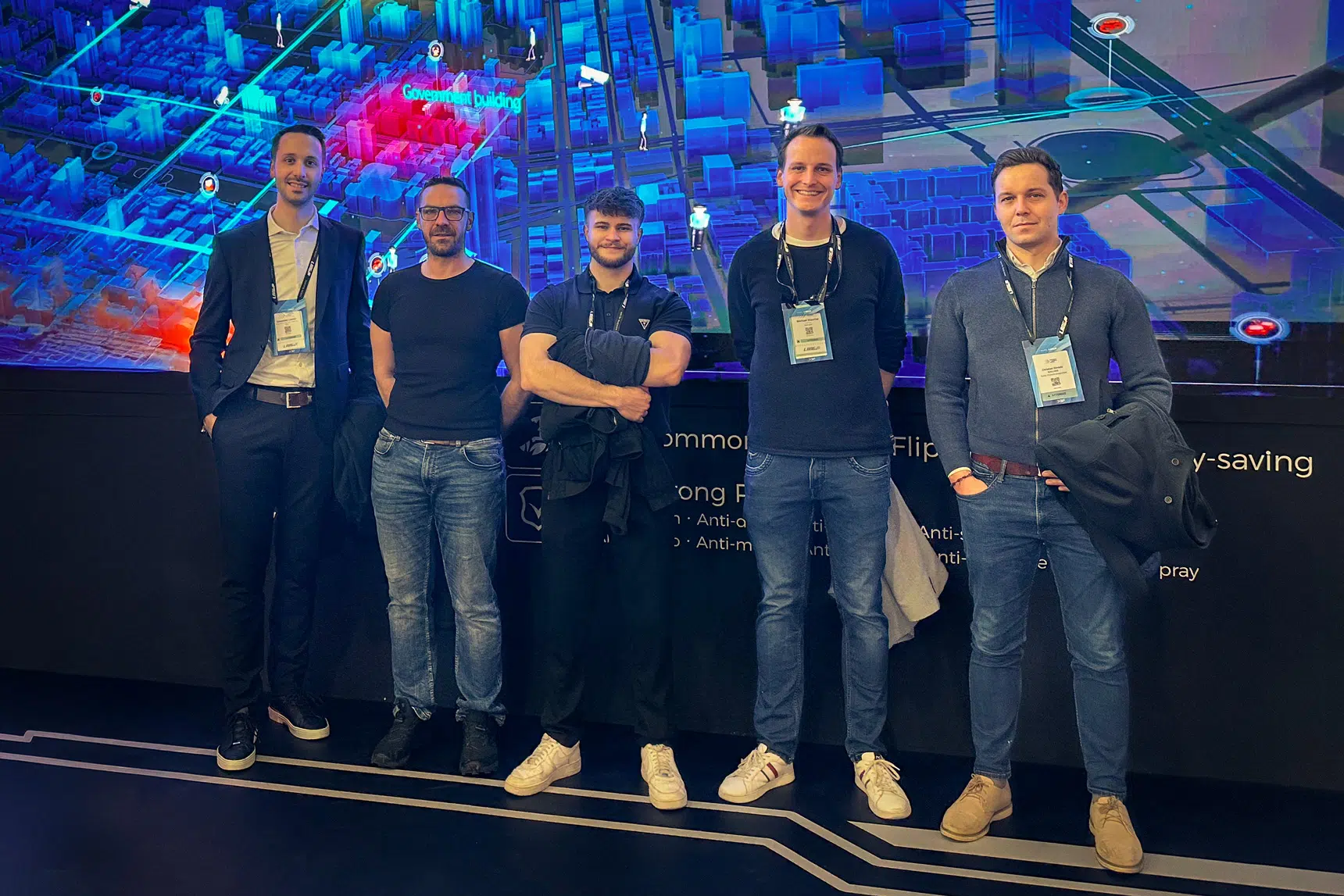Das Team Wallerie auf der ISE 2025 vor einer LED-Wall